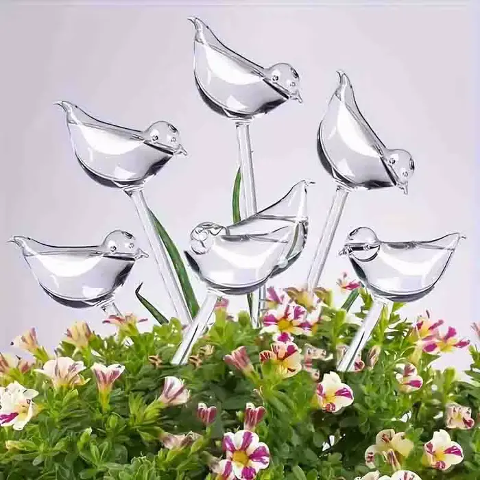 Dispositif d'arrosage automatique en forme d'oiseau pour plantes